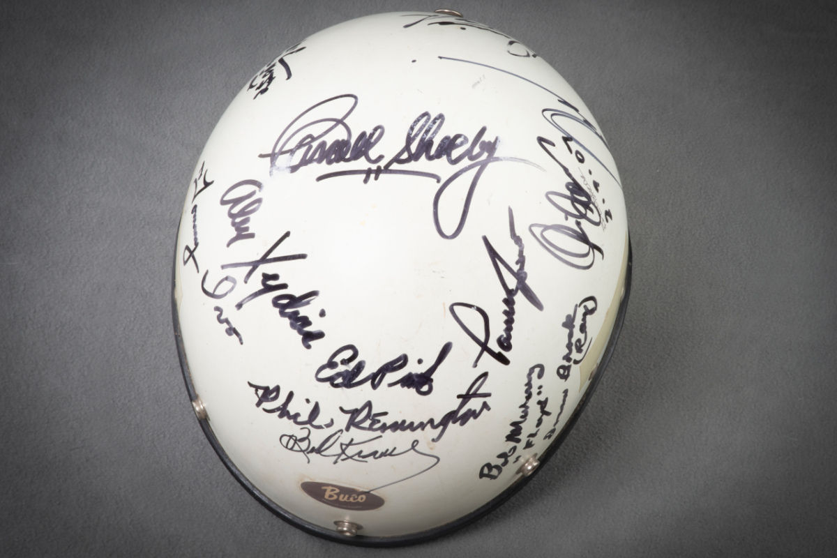 Rare buco racing helmet signed by famous race car driver has been auctioned off