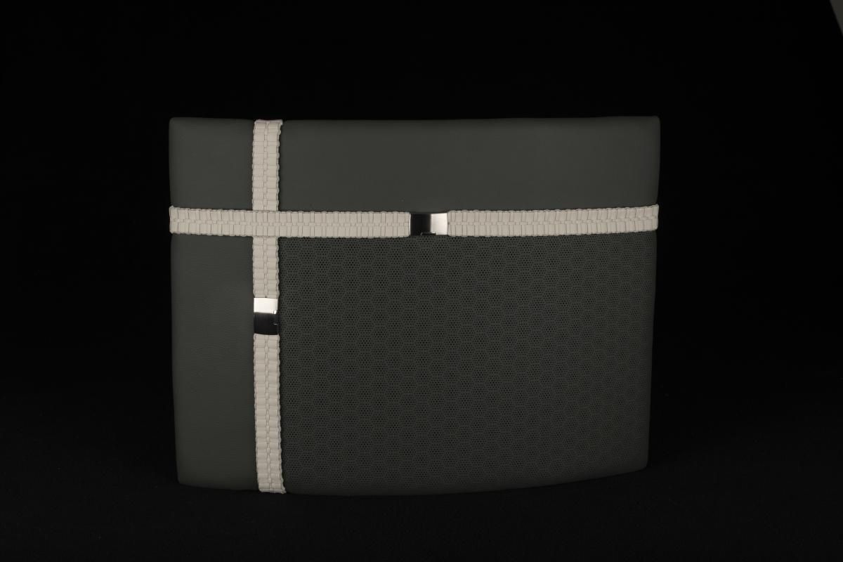 Black leather pillow with white ribbon cross