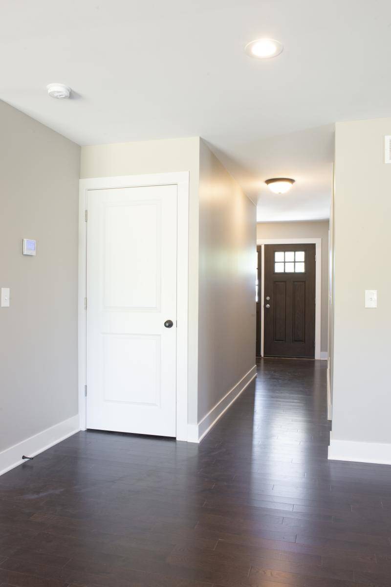 photo of real estate object from inside the house to the main door