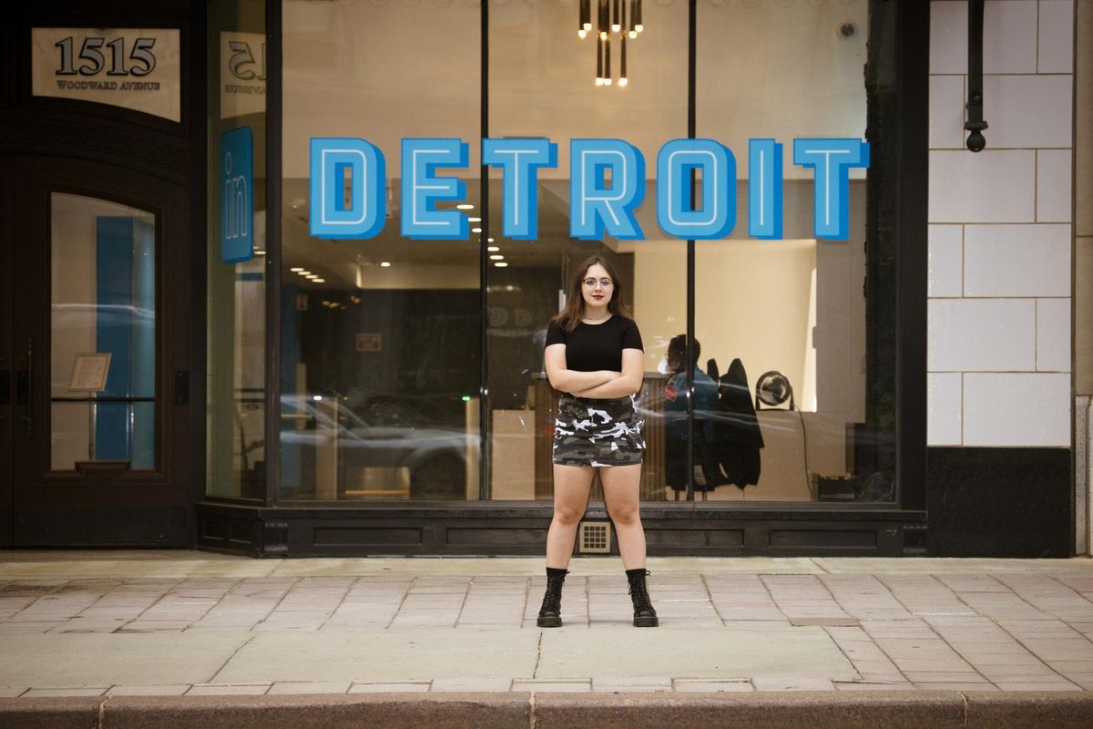 Young woman staying near LinkedIn Detroit office